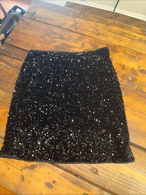 THML Black Shine On Sequin Mini Skirt. NWT. Large.